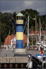 Das alte, 12 m hohe Hafeneinfahrtsfeuer von Eckernfrde steht heute nur noch als Dekoration am Binnenhafen. Es war von 1911 bis 1981 in Betrieb. 03.08.2010