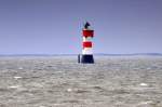 Der Leuchtturm Rotesand (Baudenkmal, Hhe 52,5m ) in der Auenweser am 18.07.2011.
Aufnahme von Bord der MS  Helgoland  bei Windstrke 6.