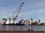 Die 2011 in Sdkorea gebaute VICTORIA MATHIAS (IMO 9578244) liegt am 20.02.2012 bei der Lloyd Werft in Bremerhaven. Dort sollen dem Windenergieanlagen-Errichterschiff noch die vier 78 m langen Hubbeine eingesetzt werden, an denen das Schiff auch noch bei ber 40 m Wassertiefe ber die Wasseroberflche hinaufklettern kann. Die VICTORIA MATHIAS ist 121 m lang (.a.), 40 m breit und wird von 6 Strahlrudern mit je 1.600 kw Leistung angetrieben. Sie bietet 60 Personen Platz.