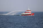 Das Feuerwehr-Löschboot ALBERT WEGENER am 21.02.2021 vor Warnemünde.