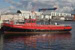 Ehemaliges Feuerwehrschiff FEUERLÖSCHBOOT; Eigner/Betreiber: Museum; Datum: 01.08.2025; Aufnahmeort: Hafen Kiel, Ostsee, Deutschland; Das Bild zeigt das FEUERLÖSCHBOOT am Anleger des Kieler