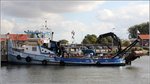 Die 1958 gebaute AUKE (ENI 02310164) liegt am 04.10.2016 in ihrem Heimathafen Urk (Niederlande). Dieses Schleppboot ist 22,72 m lang und 5,72 m breit, die Maschinenleistung beträgt 625 kW. Frühere Namen: IJSLAND, EUREKA, WATERWEG, WENDY, SEMPER.