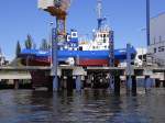 Schlepper Fairplay XV kurz vor der Wsserung im Dock. Standort SMG Werft AG Rostock-Gehlsdorf.
Gut zu sehen die Schottel Ruderpropeller.