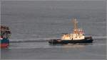 Der 1982 gebaute Schlepper HOLTENAU (IMO 8200321) ist am 05.09.2014 in Bremerhaven im Einsatz. Die HOLTENAU ist 26 m lang, 8,5 m breit, hat eine Maschinenleistung von 1.440 kw und einen Pfahlzug von 28,5 t. Heimathafen ist Kiel.