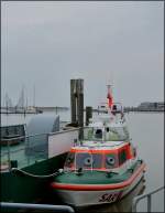 Im Hafen von Norddeich liegt das Seenotrettungschiff  Cassen Knigge  vor Anker, aufgenommen bei Ebbe am 08.05.2012.