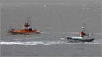 Der Seenotkreuzer BREMEN (links, Baujahr 1931) und das Motorrettungsboot RICKMER BOCK (Baujahr 1944) beteiligten sich am 30.05.2015 an der Rettungsbootparade anlässlich des 150. Geburtstages der DGzRS auf der Weser in Bremerhaven.