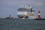 Aidadiva und das Spezial-Schiff Arkona am 17.05.2025 in Warnemünde.