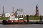Die ARION (IMO 7726902) liegt am 23.04.2011 an der Schlepperpier vor der Kulisse Bremerhavens, rechts das Oberfeuer Bremerhaven, auch nach seinem Architekten Simon-Loschen-Turm genannt.