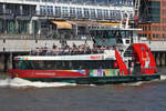 Hadag Hafenfähre HAMBURGENSIE (ENI 04810920); Eigner/Betreiber: Hadag; Datum: 10.06.2015; Aufnahmeort: Elbe/Hafen Hamburg, Deutschland. Das Bild zeigt die HAMBURGENSIE vor dem Anleger Dockland.