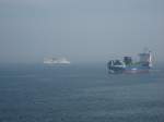 Ein Schiff von Scandlines auf der Fhrt von Puttgarden nach Roedby und ein Guterschiff.