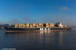 Die schöne MSC Asya ebenfalls auslaufend aus dem Hamburger Hafen am 02.12.09 bei noch leichtem Nebel.