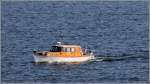 Ein lteres Motorboot ist vor Helsinki unterwegs. 19.05.2013