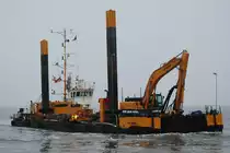 Die Martin Friedrich Flagge:Deutschland L�nge:40.0m Breite:11.0m am 08.12.10 vor der Alten Liebe Cuxhaven aufgenommen.