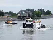 ATLANTIS(IMO:2007085;15,5x7mtr;Baujahr 1972) �berholt mit ihren 860PS die MON-DESIR(2205284);100902