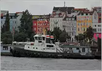 Schubschlepper Constant, Flagge DE, IMO 8701090, MMSI 211283410, L 28 m ,B 9 m, liegt am 21.09.2013 im Hafen von Hamburg am Kai.