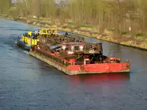 SB Birk.B. (05801510 , 21,65 x 8,17) schiebt am 27.03.2014 im Havelkanal den mit der Kogge Kogas beladenen SL 3205 (05606100 , 32,50 x 9,5) bei Paretz zu Tal.