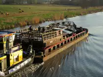 SL 3205 (0566100 , 32,50 x 9,5) , ist mit der Kogge Kogas (nähere Info's in der Berl.Morgenpost vom 29.03.14) beladen am 27.03.2014 im Havelkanal bei Paretz zu Tal Ri. Berlin unterwegs.  