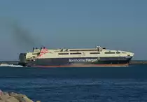 LEONORA – CRISTINA Die Katamaran-F�hre von Bornholmer Faergen l�uft aus dem Hafen aus, zur Insel Bornholm. In Ystad am 22.07.2014 beobachtet. Heimathafen R�nne, Stapellauf: 2011, L: 112,6m, B: 27,5m, T: 8,5m, Besatzung: 30-35,  Maschinenleistung 36400 kw (49490 PS) bei 4 Dieselmotoren: MAN 20V28/33D,  macht 40kn (74km), hat eine Kapazit�t von 375 PKW´s  und 1400 Personen.