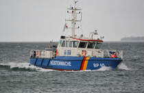 BP 65  Rhön 2  der Küstenwache bei der Einfahrt in den Rostocker Hafen, Mai 2014.