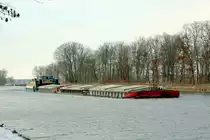 Schubboot  RENTRANS-CARGO-2  (08355151 , 21,14 x 8,25m) schob am 01.02.2021 drei je 32,50m lange Leichter im Sacrow-Paretzer-Kanal / UNTERE HAVEL-WASSERSTRASSE  Höhe km 22 / Fahrlander See zu Berg.