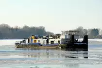 Schubboot  ORION II  (05609480 , 25,22 x 8,16m)  am 10.02.2021 im  WEIßER SEE  /  UNTERE HAVEL-WASSERSTRASSE  an der Liegestelle Neu-Fahrland / Nedlitz.