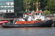 Schlepper BUGSIER 19; Eigner/Betreiber: Bugsier; Aufnahmeort: Elbe/Hafen Hamburg, Deutschland; Datum: 10.06.2015; Info: (IMO 9158472) VSP-Schlepper / BRZ 359 / Lüa 30,6 m, B 11,0 m, Tg 5,12 m / 2 x Deutz SBV9M 628, VSP 28 G II, 3690 kW, 5016 PS, 13 kn, Pfahlzug 50 t / 1997 bei Hitzler-Werft, Lauenburg, D. Das Bild zeigt die BUGSIER 19 am Schlepperponton Neumühlen.