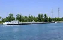 GMS La Camargue, rheinabwärts vor der Staustufe Fessenheim/Elsaß, Heckansicht, Juni 2025